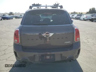 2013 MINI Countryman S ALL4 z VIN WMWZC5C51DWP30390, wystawiony jako Copart lot #59869105 z przebiegiem 111 843 mil mil oraz Szkoda całkowita • Salvage title. Historia ofert i sprzedaży dostępna na DreamBid. Obrazek 6.