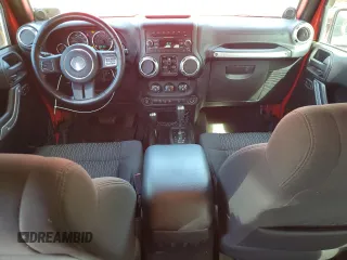 2012 Jeep Wrangler Unlimited Sahara with VIN 1C4BJWEG0CL128417, listed as a Copart auction lot 56243815 with 95,635 mi miles and Salvage title. Bid and sale history available at DreamBid. Image 8.
