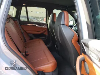 2022 BMW X3 M z VIN 5YM13EC01N9L57914, wystawiony jako Copart lot #38498483 z przebiegiem 17 261 mil mil oraz Szkody całkowita. Historia ofert i sprzedaży dostępna na DreamBid. Obrazek 11.