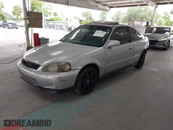 2000 Honda Civic EX with VIN 1HGEJ8244YL015940, listed as a IAAI auction lot 42427040 with 217,792 mi miles and . Bid and sale history available at DreamBid. Image 2.