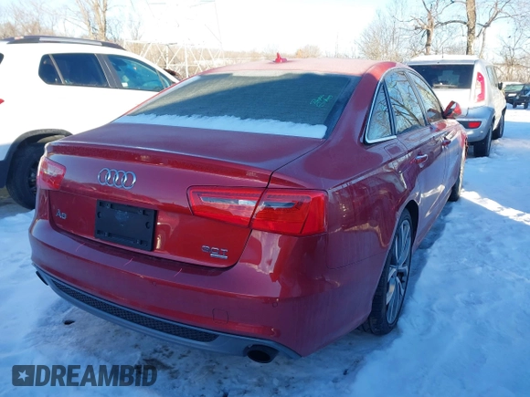 2013 Audi A6 3.0T Prestige with VIN WAUJGAFC5DN030463, listed as a IAAI auction lot 41304345 with 134,216 mi miles. Bid and sale history available at carsss.com. Image 4.