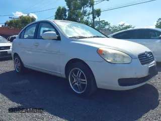 2009 Hyundai Accent Auto GLS with VIN KMHCN46C19U368700, listed as a IAAI auction lot 41590180 with 165,836 mi miles. Bid and sale history available at carsss.com. Image 1.