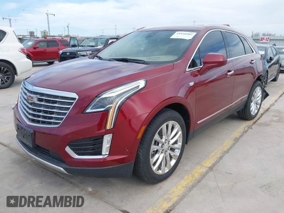 2017 Cadillac XT5 Platinum AWD with VIN 1GYKNFRS9HZ126747, listed as a IAAI auction lot 41810902 with 106,507 mi miles. Bid and sale history available at carsss.com. Image 2.