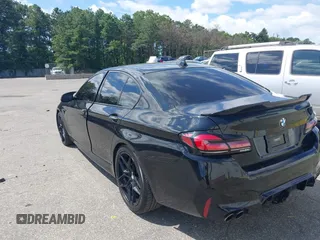 2015 BMW 5 Series 535i xDrive with VIN WBA5B3C51FD544384, listed as a IAAI auction lot 42810878 with 67,014 mi miles and . Bid and sale history available at DreamBid. Image 3.