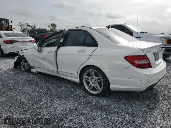 2014 Mercedes-Benz C 250 Sport with VIN WDDGF4HB4EG231661, listed as a Copart auction lot 59657335 with 83,731 mi miles and Salvage title. Bid and sale history available at DreamBid. Image 2.