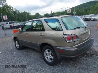 2002 Lexus RX 300 with VIN JTJGF10U220135180, listed as a IAAI auction lot 42646437 with 184,559 mi miles and . Bid and sale history available at DreamBid. Image 3.