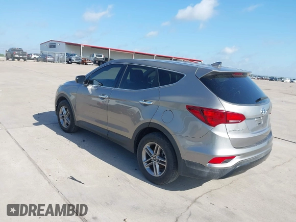 2017 Hyundai Santa Fe 2.4L z VIN 5XYZTDLB7HG444033, wystawiony jako IAAI lot #42263907 z przebiegiem 107 454 mil mil oraz . Historia ofert i sprzedaży dostępna na DreamBid. Obrazek 3.