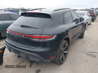 2023 Porsche Macan with VIN WP1AA2A54PLB16364, listed as a IAAI auction lot 41624533 with 30,309 mi miles. Bid and sale history available at carsss.com. Image 4.