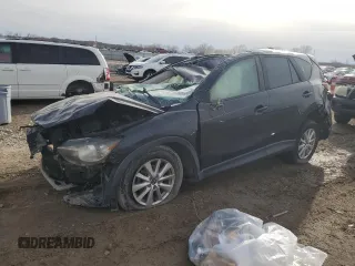 2015 Mazda CX-5 Touring with VIN JM3KE4CY4F0434425, listed as a Copart auction lot 48111255 with Not Provided miles and Salvage Title. Bid and sale history available at DreamBid. Image 1.