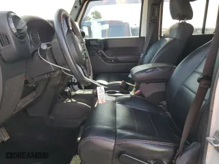 2012 Jeep Wrangler Unlimited Sahara with VIN 1C4BJWEG6CL256452, listed as a Copart auction lot 53305115 with 50,944 mi miles and Salvage Title. Bid and sale history available at carsss.com. Image 7.