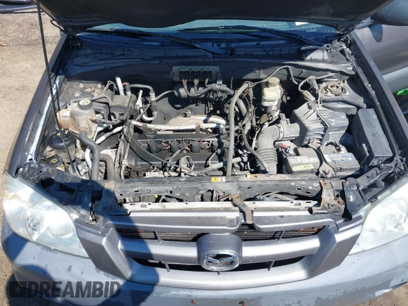 2006 Mazda Tribute i with VIN 4F2YZ92Z16KM25216, listed as a IAAI auction lot 41664006 with 228,222 mi miles and . Bid and sale history available at carsss.com. Image 10.