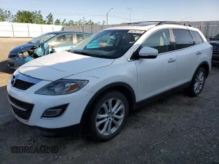 2011 Mazda CX-9 Grand Touring z VIN JM3TB3DAXB0323249, wystawiony jako Copart lot #58782775 z przebiegiem 305 794 mil mil oraz Szkoda całkowita • Salvage title. Historia ofert i sprzedaży dostępna na DreamBid. Obrazek 1.