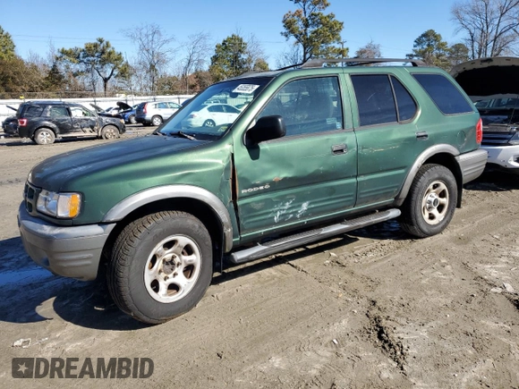2002 Isuzu Rodeo S z VIN 4S2CK58W724334510, wystawiony jako Copart lot #45355875 z przebiegiem 121 884 mil mil oraz Tytuł czysty. Historia ofert i sprzedaży dostępna na DreamBid. Obrazek 1.