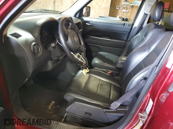 2016 Jeep Patriot High Altitude with VIN 1C4NJRFBXGD597578, listed as a Copart auction lot 58857115 with 128,911 mi miles and Salvage title. Bid and sale history available at DreamBid. Image 7.