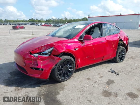 2023 Tesla Model Y Long Range with VIN 7SAYGDEE1PA154996, listed as a IAAI auction lot 41472595 with 24,861 mi miles and . Bid and sale history available at DreamBid. Image 17.