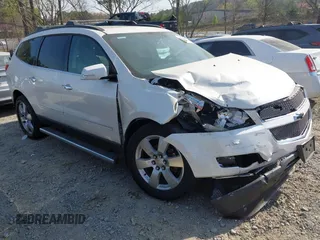 2011 Chevrolet Traverse LTZ z VIN 1GNKVLED5BJ128357, wystawiony jako IAAI lot #41889590 z przebiegiem 172 325 mil mil oraz . Historia ofert i sprzedaży dostępna na DreamBid. Obrazek 1.