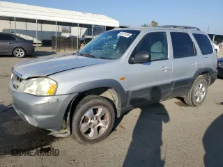 2002 Mazda Tribute LX with VIN 4F2YU09152KM50320, listed as a Copart auction lot 88131405 with 238,013 mi miles and Salvage Title. Bid and sale history available at carsss.com. Image 1.