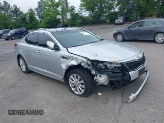2015 Kia Optima EX z VIN 5XXGN4A72FG442644, wystawiony jako IAAI lot #42230416 z przebiegiem 88 509 mil mil oraz . Historia ofert i sprzedaży dostępna na DreamBid. Obrazek 1.