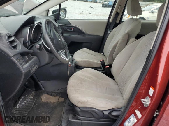 2012 Mazda 5 Sport with VIN JM1CW2BL6C0112031, listed as a Copart auction lot 71823644 with 254,294 mi miles and Salvage Title. Bid and sale history available at DreamBid. Image 7.