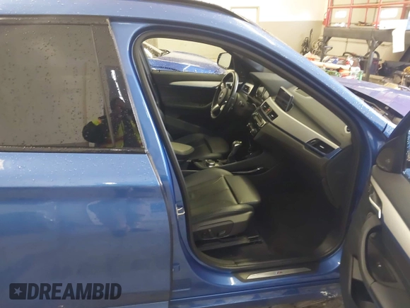 2019 BMW X1 xDrive28i with VIN WBXHT3C53K5L36690, listed as a IAAI auction lot 42012992 with 70,339 mi miles. Bid and sale history available at carsss.com. Image 5.