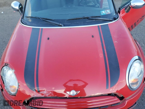 2011 MINI Convertible с VIN WMWZN3C55BT133269, выставлен на аукционе Copart как лот 74062294 с пробегом 48 582 миль миль и Списание • Salvage title. История ставок и продаж доступна на DreamBid. Изображение 11.