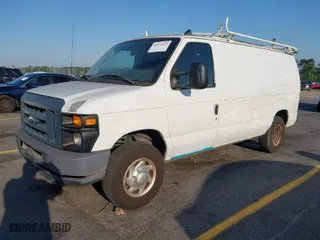 2013 Ford Econoline Cargo Van Commercial with VIN 1FTNE2EW1DDA18621, listed as a IAAI auction lot 42074413 with 204,073 mi miles. Bid and sale history available at carsss.com. Image 2.