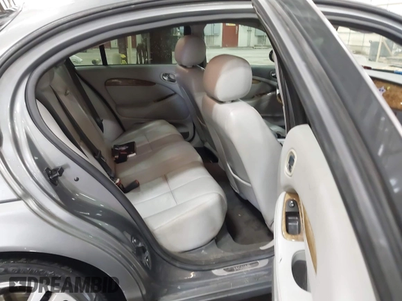 2005 Jaguar S-Type with VIN SAJWA01T85FN43991, listed as a IAAI auction lot 42055271 with 114,454 mi miles and . Bid and sale history available at DreamBid. Image 8.