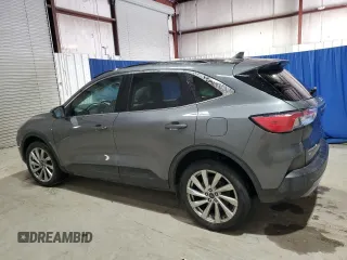 2021 Ford Escape Titanium with VIN 1FMCU9J94MUA78942, listed as a Copart auction lot 88119075 with 55,153 mi miles and Salvage Title. Bid and sale history available at carsss.com. Image 2.
