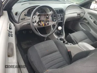 1999 Ford Mustang GT с VIN 1FAFP42X2XF170803, выставлен на аукционе Copart как лот 56756075 с пробегом Не указан миль и Списание • Salvage title. История ставок и продаж доступна на DreamBid. Изображение 8.