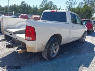 2009 Dodge Ram 1500 SLT with VIN 1D3HB18T89S809854, listed as a IAAI auction lot 41780506 with 148,218 mi miles. Bid and sale history available at carsss.com. Image 4.