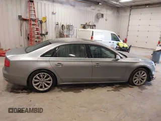 2012 Audi A8 with VIN WAURVAFD7CN021716, listed as a IAAI auction lot 42330229 with 97,359 mi miles and . Bid and sale history available at DreamBid. Image 13.