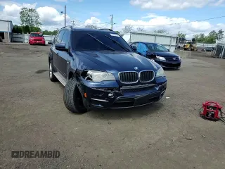 2012 BMW X5 35i with VIN 5UXZV4C56CL754643, listed as a Copart auction lot 55970125 with 150,584 mi miles and Salvage title. Bid and sale history available at DreamBid. Image 13.