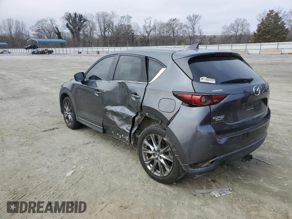 2019 Mazda CX-5 Signature with VIN JM3KFBEY3K0609305, listed as a Copart auction lot 44146455 with 33,104 mi miles and Salvage Title. Bid and sale history available at carsss.com. Image 2.