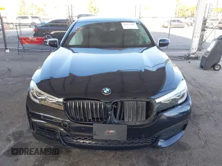 2019 BMW 7 Series 740i with VIN WBA7E2C58KB218419, listed as a IAAI auction lot 41831080 with 97,752 mi miles and . Bid and sale history available at DreamBid. Image 12.