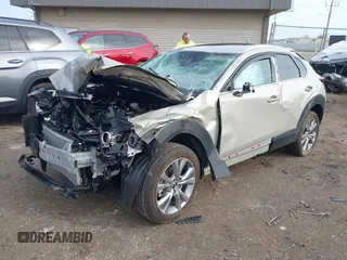 2023 Mazda CX-30 S Premium with VIN 3MVDMBDMXPM563500, listed as a IAAI auction lot 42092423 with 9,148 mi miles and . Bid and sale history available at DreamBid. Image 18.