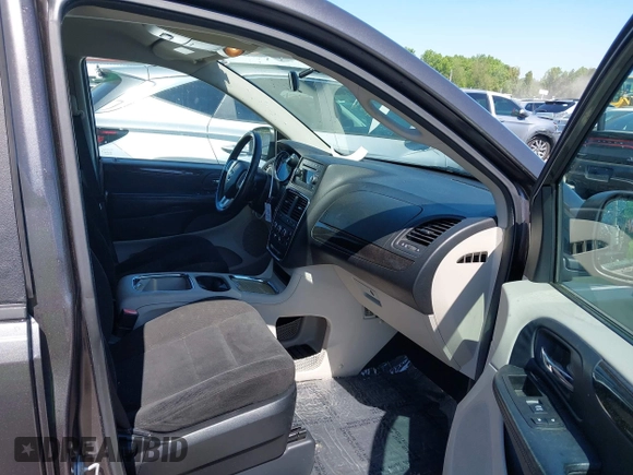 2015 Dodge Grand Caravan SXT with VIN 2C4RDGCG4FR631362, listed as a IAAI auction lot 42027066 with 149,599 mi miles and . Bid and sale history available at DreamBid. Image 5.