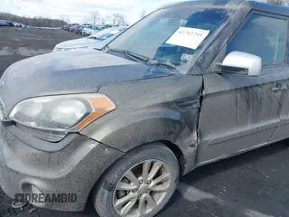 2012 Kia Soul + with VIN KNDJT2A60C7392564, listed as a IAAI auction lot 41702795 with 147,282 mi miles. Bid and sale history available at carsss.com. Image 6.