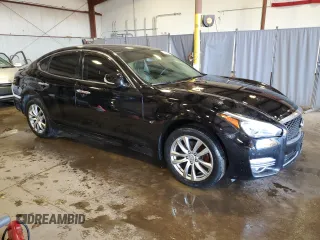 2017 Infiniti Q70 with VIN JN1BY1AR4HM770553, listed as a Copart auction lot 50878195 with 136,455 mi miles and Salvage Title. Bid and sale history available at carsss.com. Image 4.