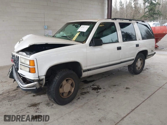 1998 GMC Yukon with VIN 1GKEK13R7WJ700881, listed as a IAAI auction lot 41507538 with 188,396 mi miles. Bid and sale history available at carsss.com. Image 17.