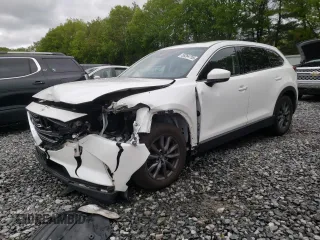 2022 Mazda CX-9 Touring with VIN JM3TCBCYXN0619317, listed as a Copart auction lot 58264755 with 139,478 mi miles and Salvage title. Bid and sale history available at DreamBid. Image 1.