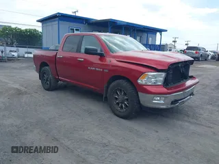 2012 Ram 1500 Big Horn z VIN 1C6RD7LTXCS254468, wystawiony jako IAAI lot #42021883 z przebiegiem 92 070 mil mil oraz . Historia ofert i sprzedaży dostępna na DreamBid. Obrazek 1.