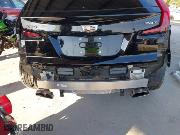 2020 Cadillac XT4 FWD Premium Luxury with VIN 1GYFZCR42LF144359, listed as a IAAI auction lot 42012677 with 34,490 mi miles and . Bid and sale history available at carsss.com. Image 19.
