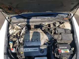 2005 Honda Accord LX SE z VIN 1HGCM82425A016199, wystawiony jako Copart lot #74949244 z przebiegiem 206 144 mil mil oraz Szkoda całkowita • Salvage title. Historia ofert i sprzedaży dostępna na DreamBid. Obrazek 11.