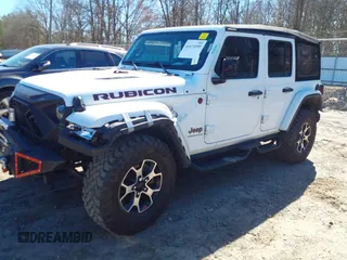 2023 Jeep Wrangler Rubicon with VIN 1C4HJXFG8PW655138, listed as a IAAI auction lot 41674959 with 40,790 mi miles and . Bid and sale history available at DreamBid. Image 2.