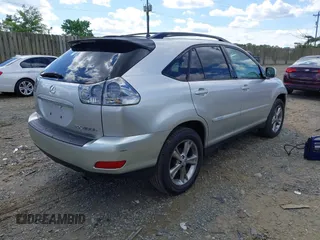 2007 Lexus RX 400h with VIN JTJGW31U672001021, listed as a IAAI auction lot 42209431 with 245,653 mi miles and . Bid and sale history available at DreamBid. Image 4.
