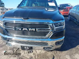 2021 Ram 1500 Big Horn z VIN 1C6RREFG1MN532758, wystawiony jako IAAI lot #41395774 z przebiegiem 66 750 mil mil oraz . Historia ofert i sprzedaży dostępna na DreamBid. Obrazek 11.