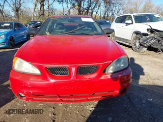 2004 Pontiac Grand Am SE2 with VIN 1G2NG52E84M672446, listed as a IAAI auction lot 40834541 with 209,231 mi miles. Bid and sale history available at carsss.com. Image 12.