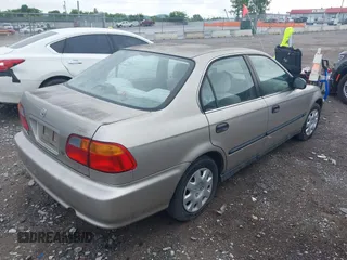 2000 Honda Civic LX z VIN 1HGEJ6675YL037812, wystawiony jako IAAI lot #42504129 z przebiegiem 72 001 mil mil oraz . Historia ofert i sprzedaży dostępna na DreamBid. Obrazek 4.