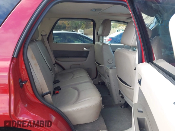 2010 Mercury Mariner Premier with VIN 4M2CN9HG5AKJ06111, listed as a IAAI auction lot 40740774 with 98,607 mi miles and . Bid and sale history available at DreamBid. Image 8.