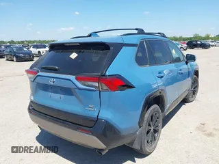 2023 Toyota RAV4 Hybrid SE with VIN 4T3T6RFV6PU130213, listed as a IAAI auction lot 42066860 with Not provided miles and . Bid and sale history available at DreamBid. Image 4.